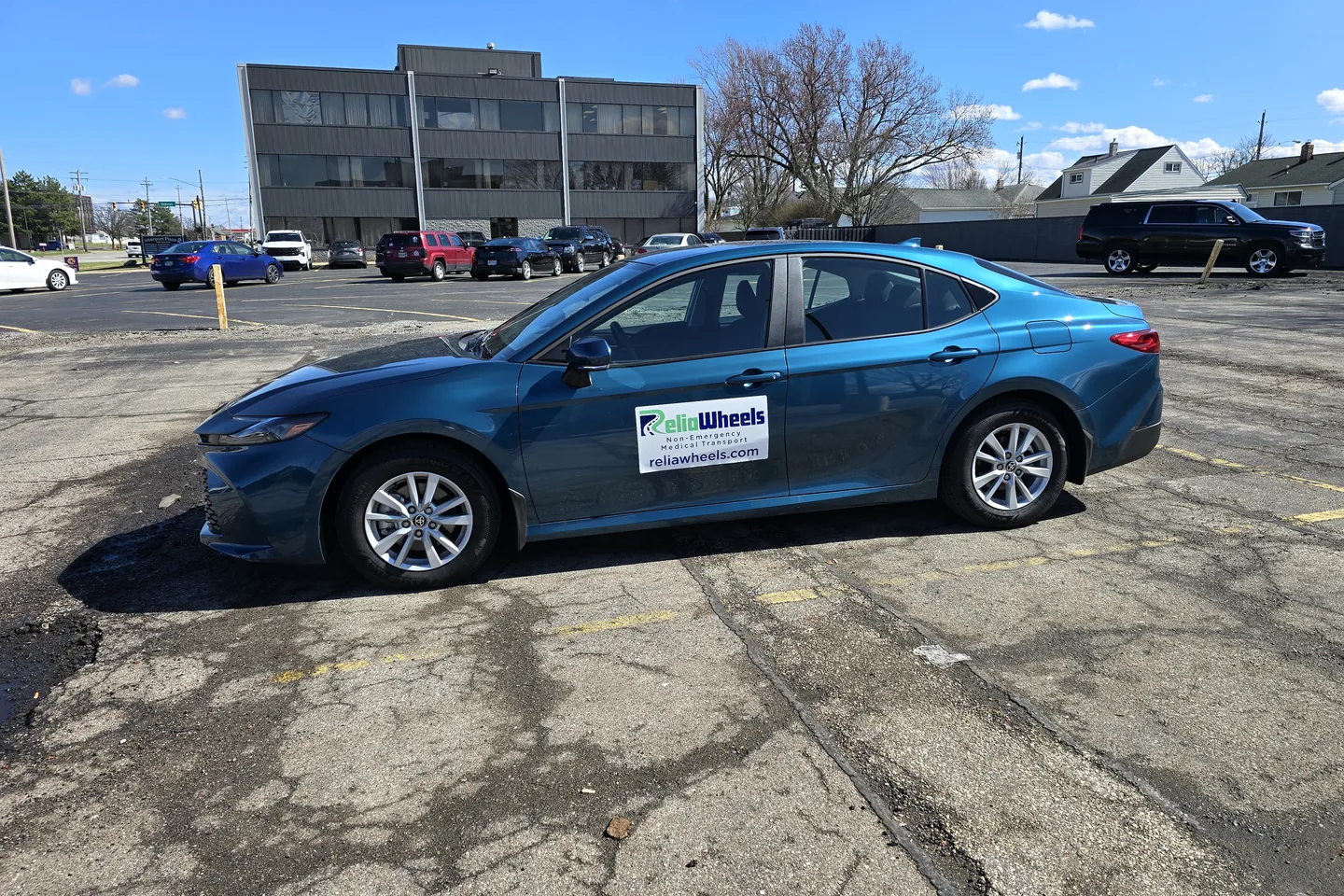 A ReliaWheels sedan parked and ready for an ambulatory trip