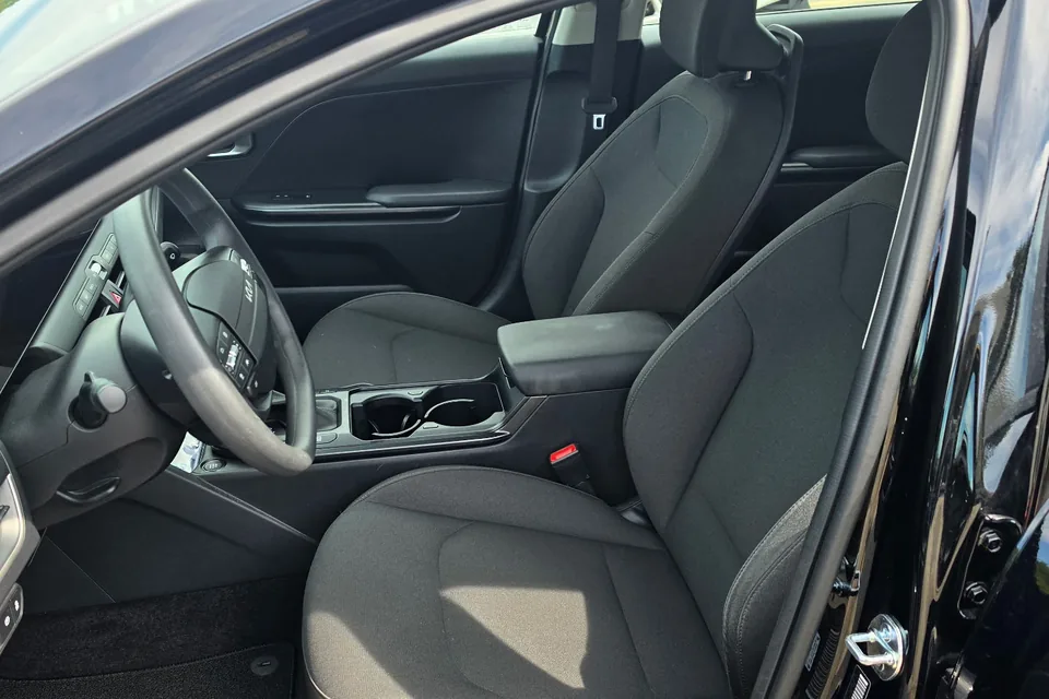 The interior of a ReliaWheels sedan, showing the front passenger seat