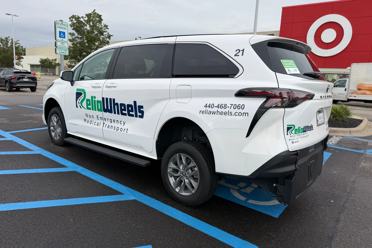 A ReliaWheels wheelchair van parked outside a Target store